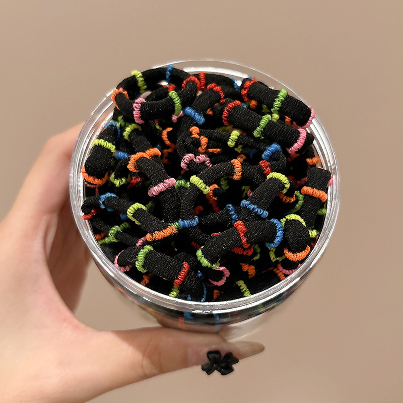 Banda de goma desechable negra corbata de pelo de mujer pequeña cubierta de cuero de alta elasticidad duradera no lastimar cuerda de pelo corbata de pelo banda de pelo verano