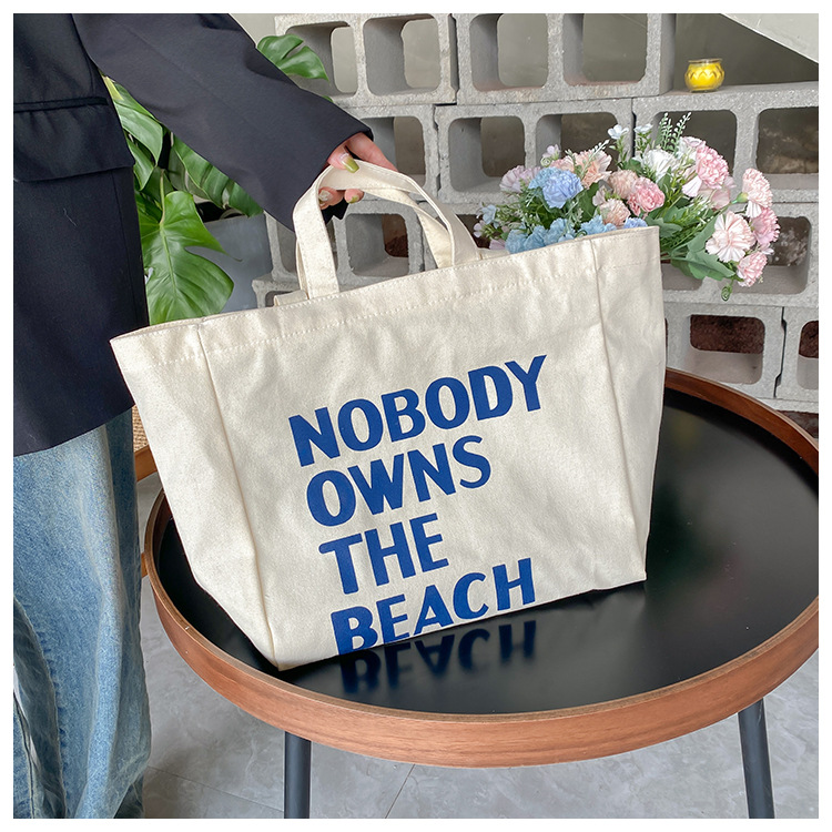A large-capacity, sturdy Japanese-style canvas bag for women, a new 2022 simple bento handbag for girls to go to work undefined