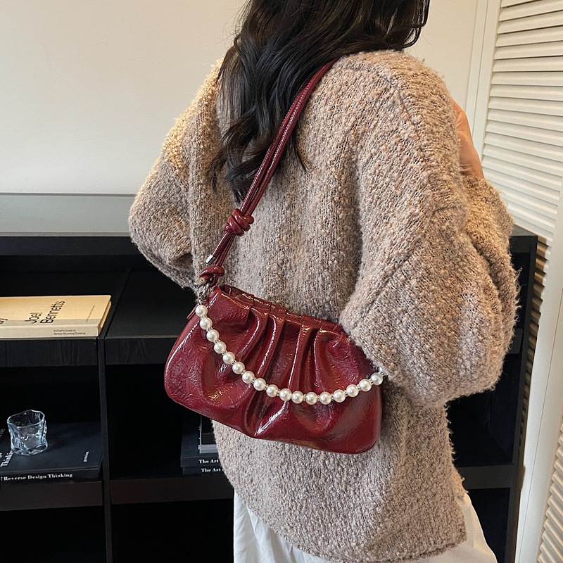 Nicho transfronterizo bolsos de brazo con cuentas para mujeres otoño / invierno 2025, nueva moda, bolsos de hombro casuales, bolsos mochilas de moda