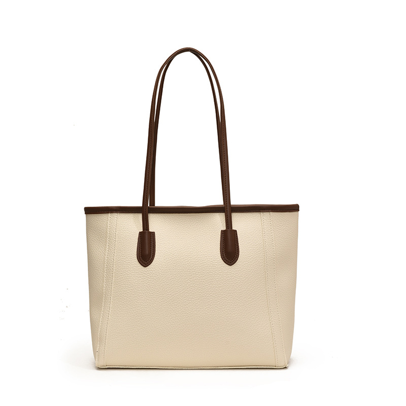 Bolso atmosférico de textura de viajero 2025 nuevo estilo de contraste de color de moda versión coreana de un solo hombro bolso de axila temperamento bolso de moda