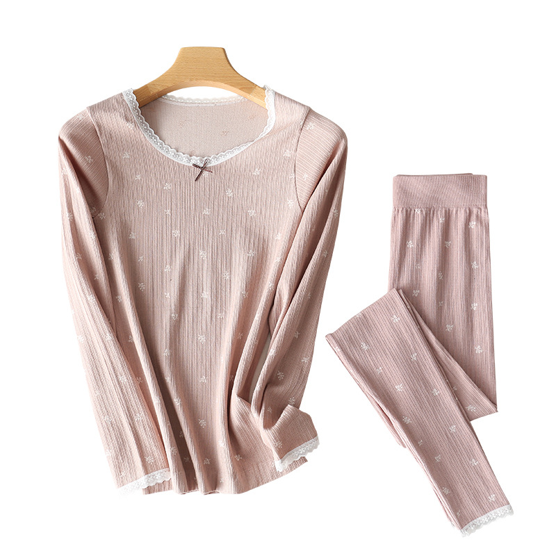 Ropa interior térmica de algodón de color Maple Leaf al por mayor 2024 primavera nuevo estilo cuello redondo sin costuras ropa de otoño pantalones largos traje mujeres