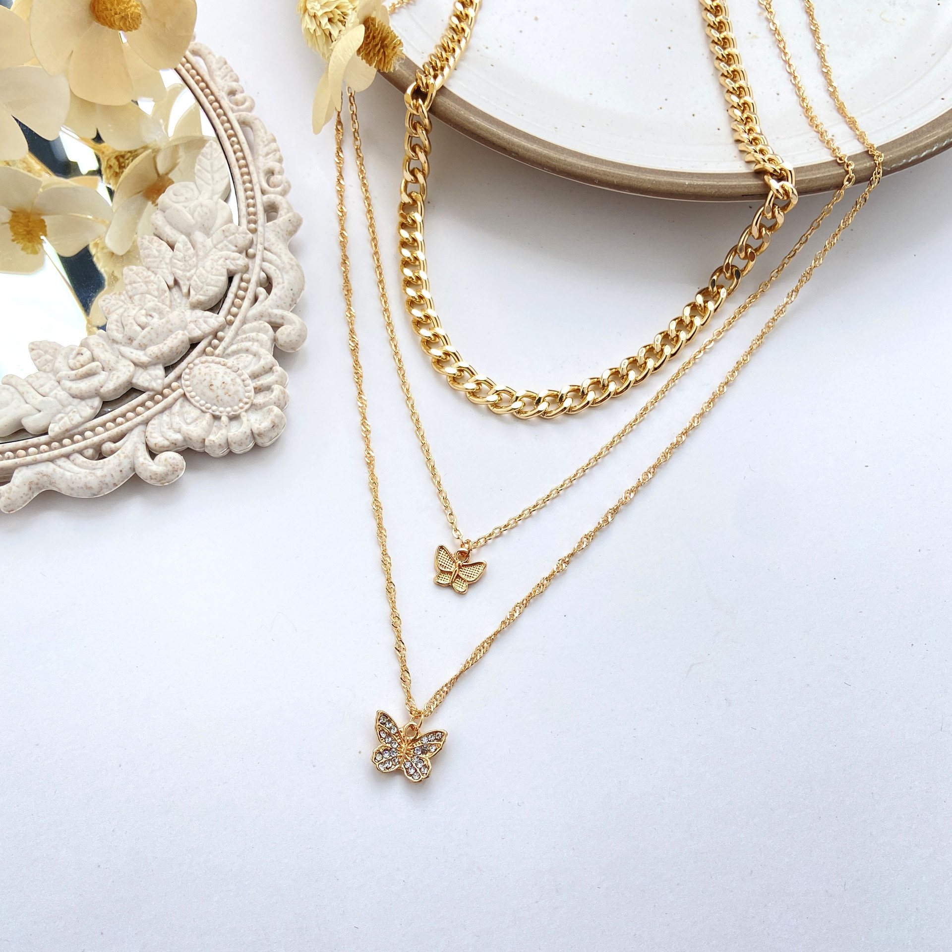 New Inlaid Rhinestone Butterfly Pendant Necklace Simple Alloy Stacking Three-layer Clavicle Chain display picture 6