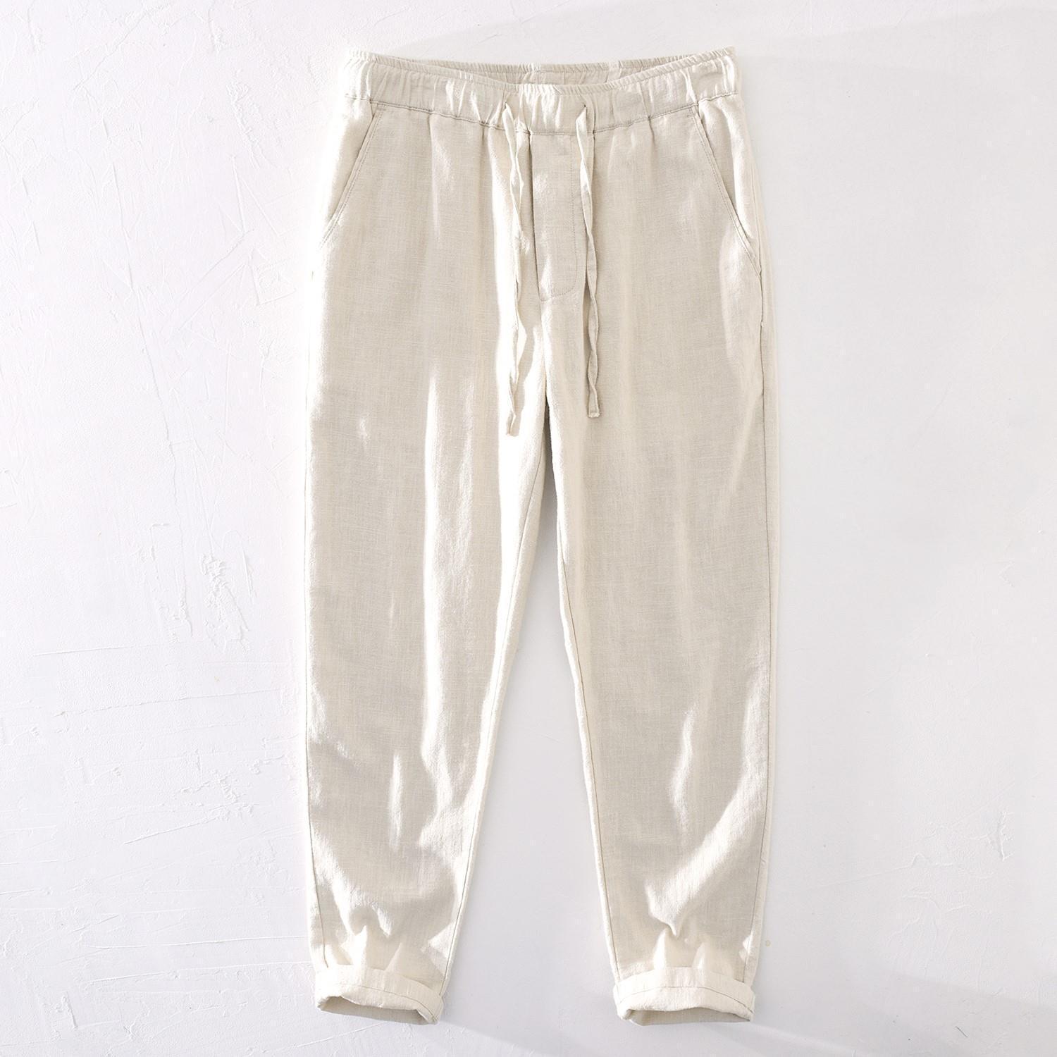 Pantalones casuales de lino rectos de algodón y lino con cintura elástica retro extremadamente cáñamo pantalones de lino sueltos de todo fósforo con cordón para hombres