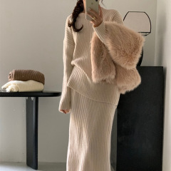 秋冬の新型の怠惰な風のゆったりした丸首のセーターの女性の半身のスカートのスーツのニットの2つのセットの女性