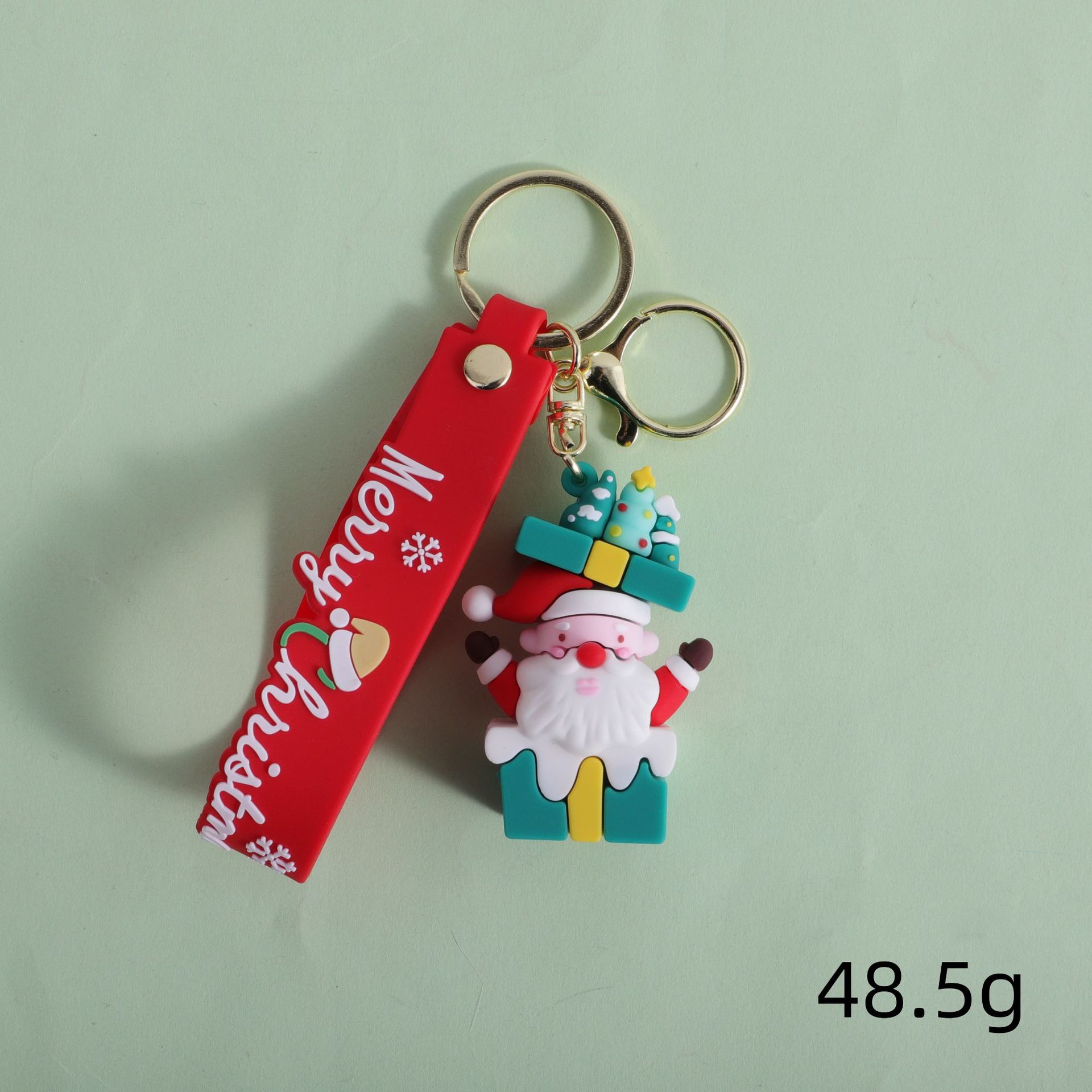 Nuevos productos transfronterizos Santa Claus llavero dibujos animados estilo lindo muñeco de nieve mochila alce colgante coche