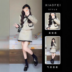 小香風スーツの女性春と秋の洋気名媛減齢蝶結びの短いコートの半身のスカートの2つのセット