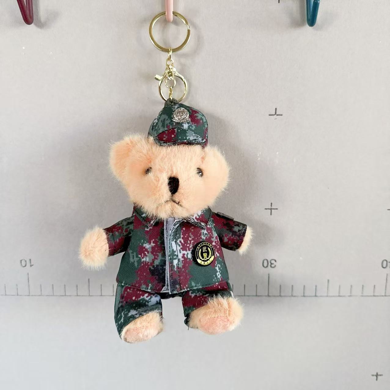 Colgante de oso de la policía armada