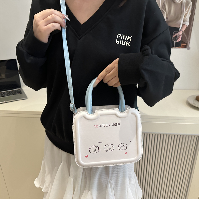 Bolso pequeño de nicho femenino 2025 primavera y verano nuevo estilo bolso bandolera de textura blanca con sentido de diseño bolso de galleta portátil pequeño bolso cuadrado