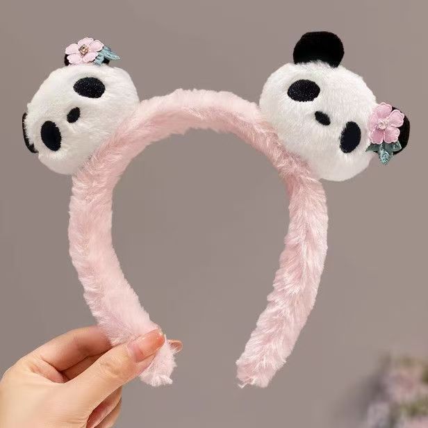 男女通用の大きいパンダのカチューシャは卸売りします。