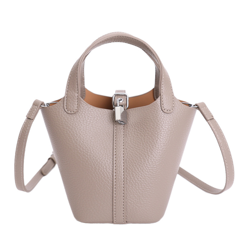 2025 nuevo bolso de cestas de verduras de mano mujer de piel suave litchi estampado de hombro bolso de cubo de agua casual bolso de mujer