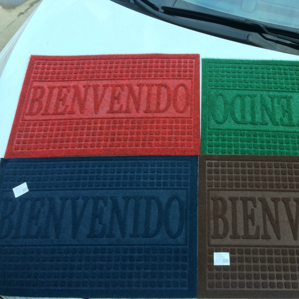 Fábrica directa de exportación barata de comercio exterior español estirado esteras en relieve ventas calientes alfombras de piso de entrada