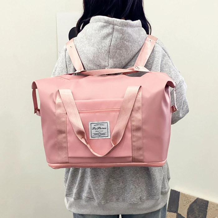 Capacious fashionable luggage travel bag to go out, worn on the shoulder