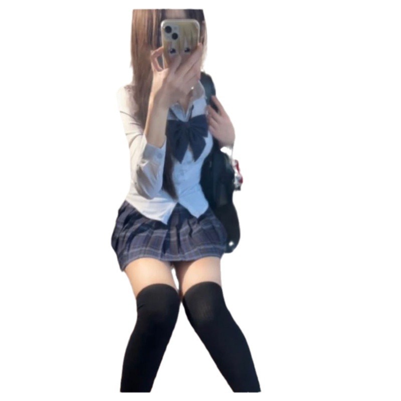 Jk制服は腰のシャツの上着を収めています。|undefined