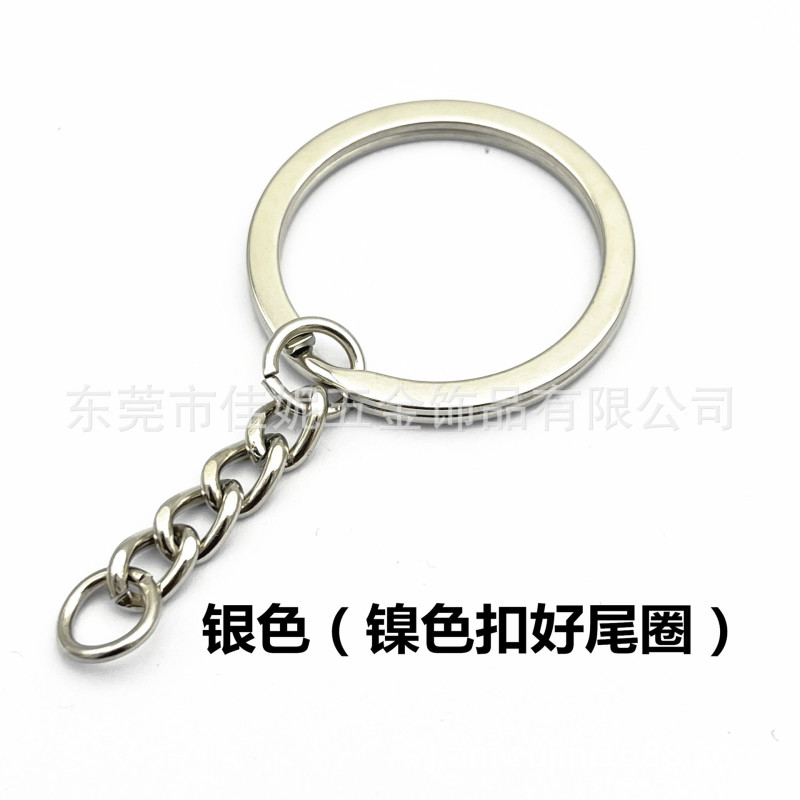 元のメーカーの現物の金色のキーホルダーは四つのチェーンを持っています。|undefined