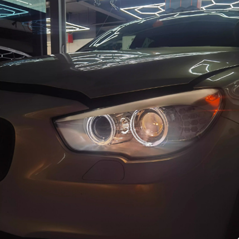 Soporte de cambio de lámpara para automóviles adecuado para 12 - 17 tipos de soporte de lente de alta luz de la serie 5 de BMW Hai3 / Hai5