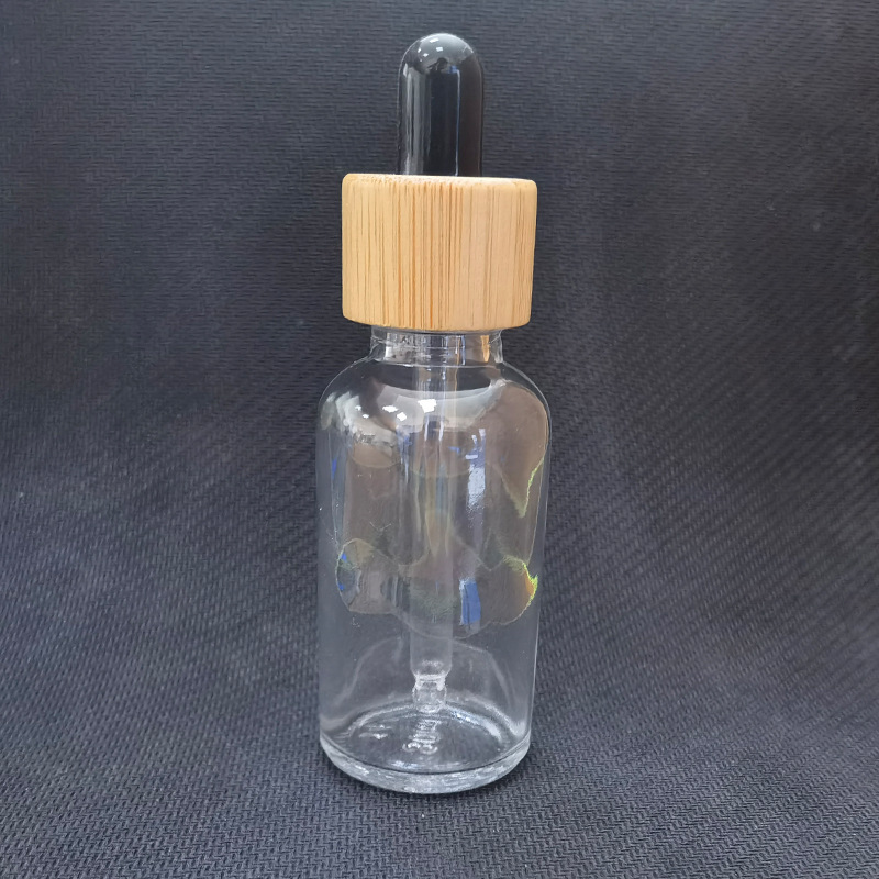 Cubierta de madera de bambú botella cosmética botella sub-botella esencia botella cuidado de la piel Paquete de envases de vidrio esmerilado botella cuentagotas botella de aceite esencial