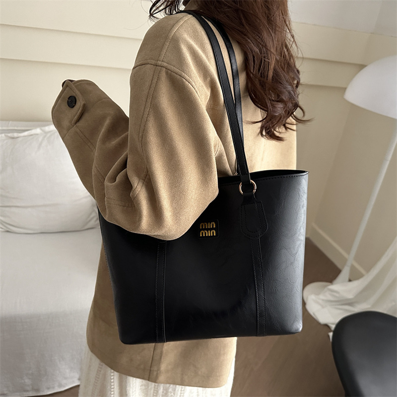 Bolsa de hombro de viaje retro de alto nivel, mujer, invierno 2024, nueva bolsa de mujer de trabajo, moda de bolsas Toto este año.