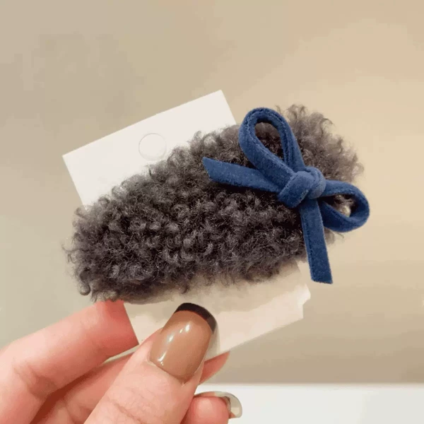 With bow, blue