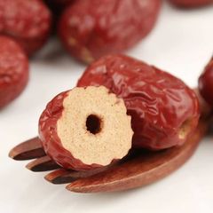 Wholesale Unseeded Ruoqiang Jujubes from Xinjiang, Hollow Core Jujubes for Making Tea, Stewing Soup, Eating Dry with Removed Seeds, Dried Jujubes with Removed Seeds