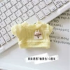 Toner, yellow T-shirt