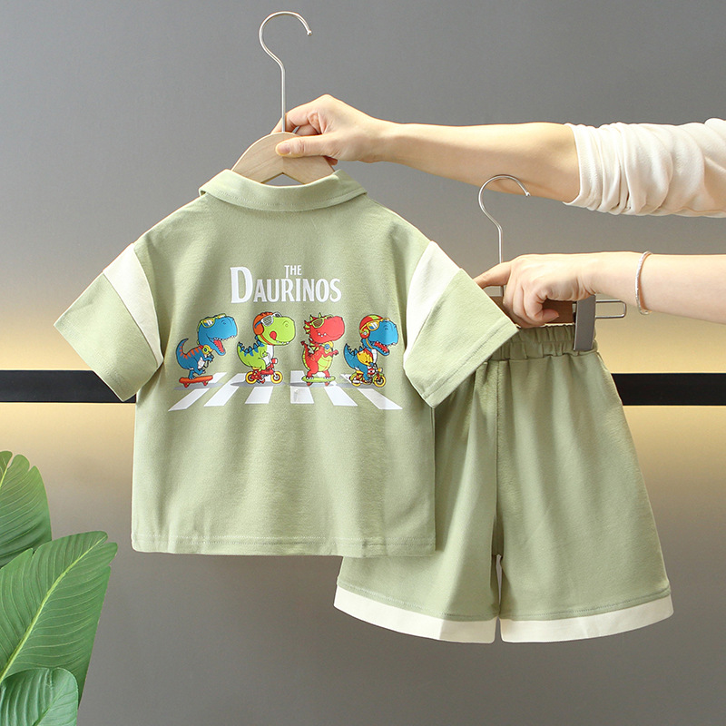 7856 traje de verano para niños 2025 nuevo traje de dos piezas de manga corta de dinosaurio para niños ropa de polo de verano para bebés