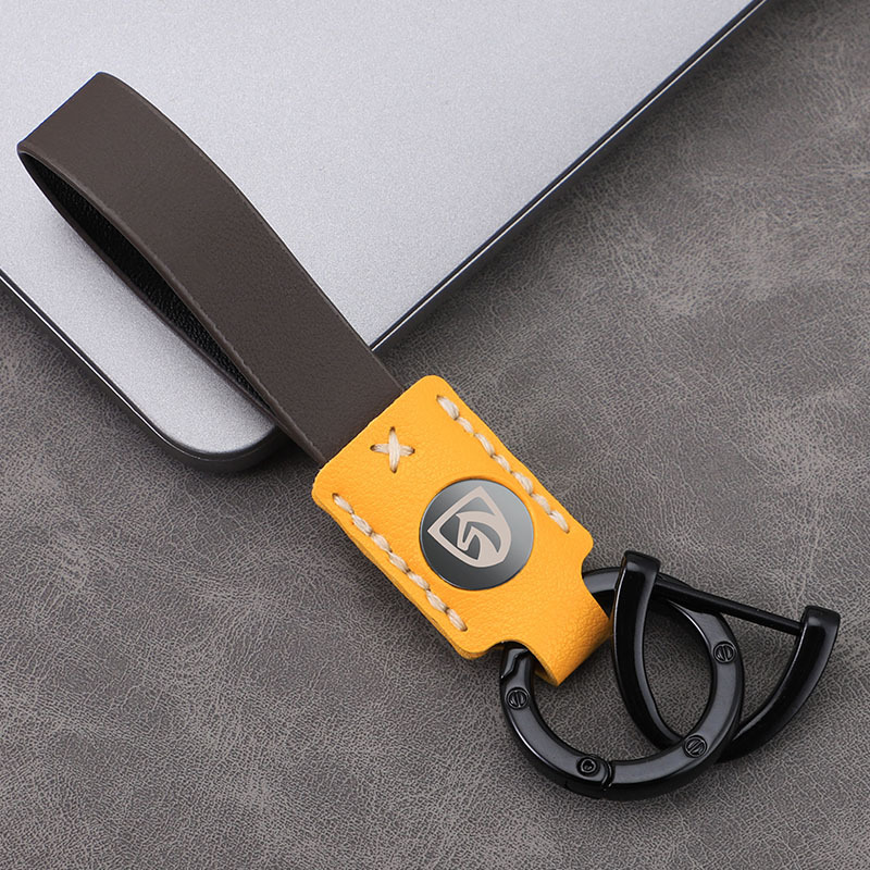 Llavero de coche láser láser cerradura de cuero de alta gama hebilla colgante de llave cuero duradero colgante de llavero de alta temperatura