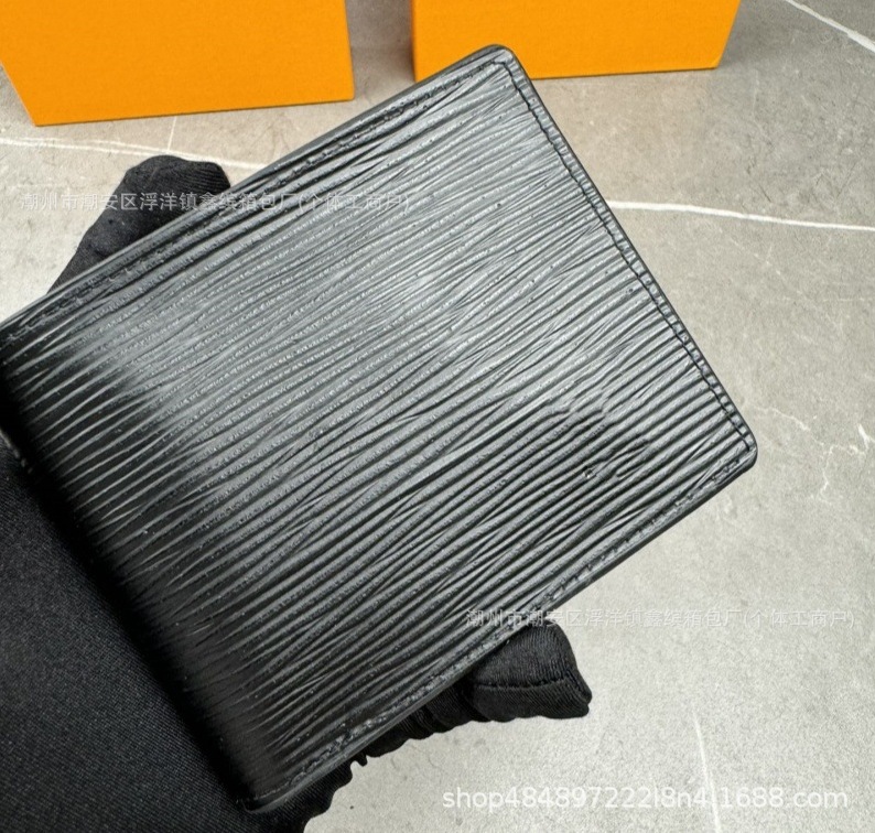 Cartera de moda de hombre transfronteriza europea y americana corta billetera de cuero real plegable para mujeres embalaje de cartera de suministro de comercio exterior Q217