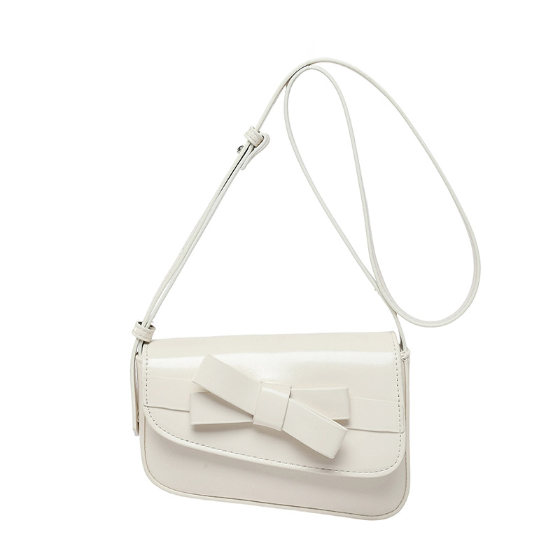 Bolso pequeño de alta calidad 2025 verano nuevo bolso femenino diseño de nicho bolso de hombro lindo lazo bolso de mensajero