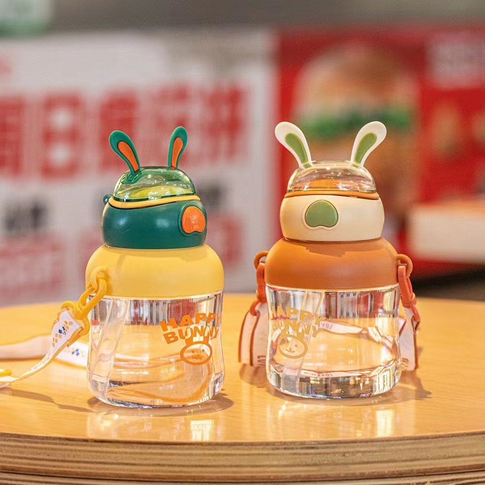 Tianyi 0932 nuevo espacio para niños taza feliz Orejas de conejo taza de plástico transparente Correa al aire libre paja taza de plástico