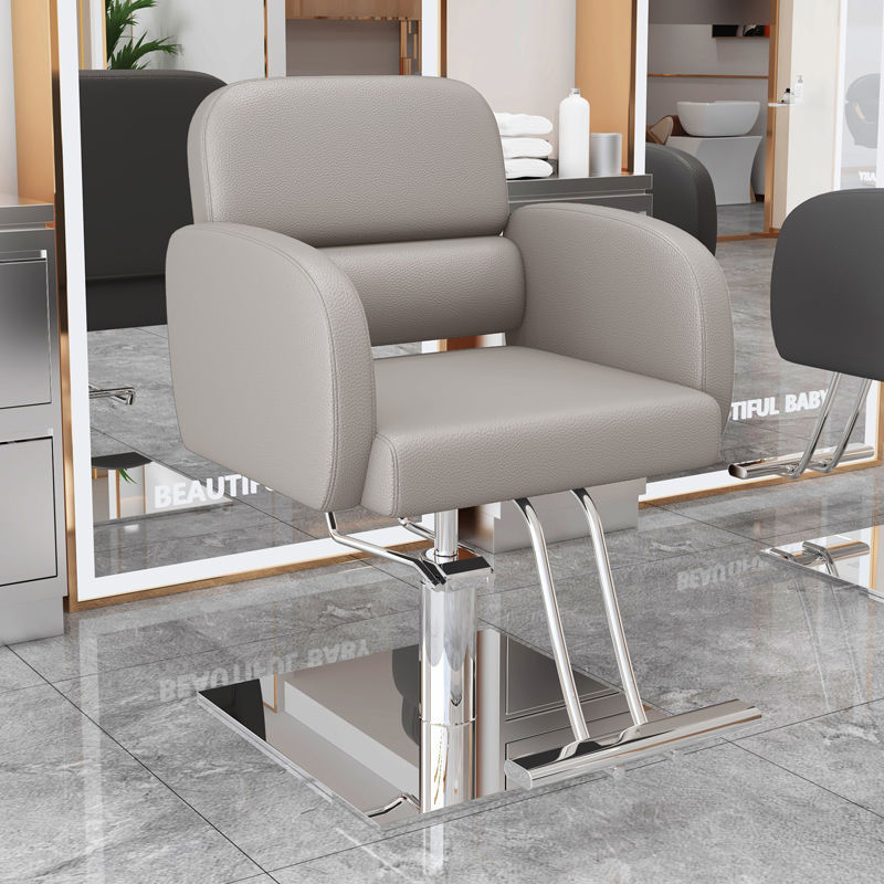 La nueva silla de peluquería simple e innovadora, la silla de peluquería teñida en permanente se puede levantar y levantar, la silla de peluquería giratoria, la silla de corte para el cabello