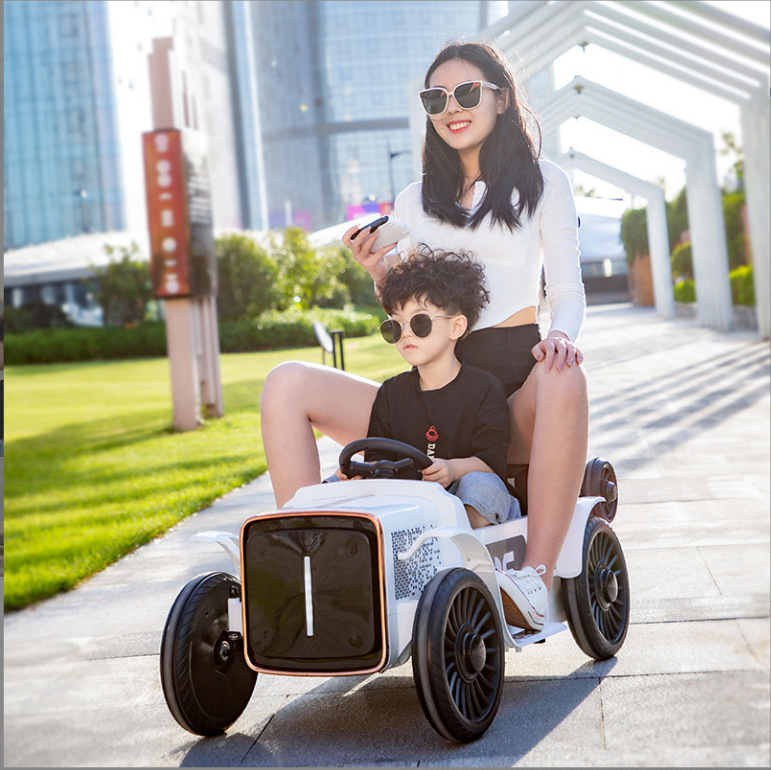 Coche eléctrico para niños coche de padres e hijos coche interactivo coche de cuatro ruedas coche de música coche de juguete puede sentarse control remoto auto-conducción