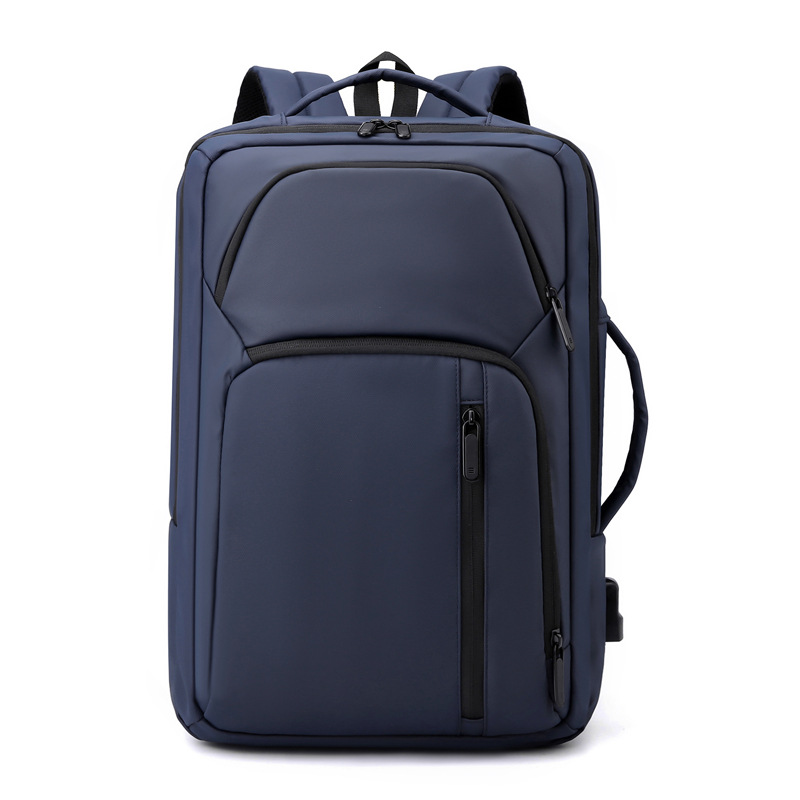 Nueva película de cuero mochila a prueba de derrames USB recargable de gran capacidad mochila de viaje de moda simple bolso de computadora para hombres