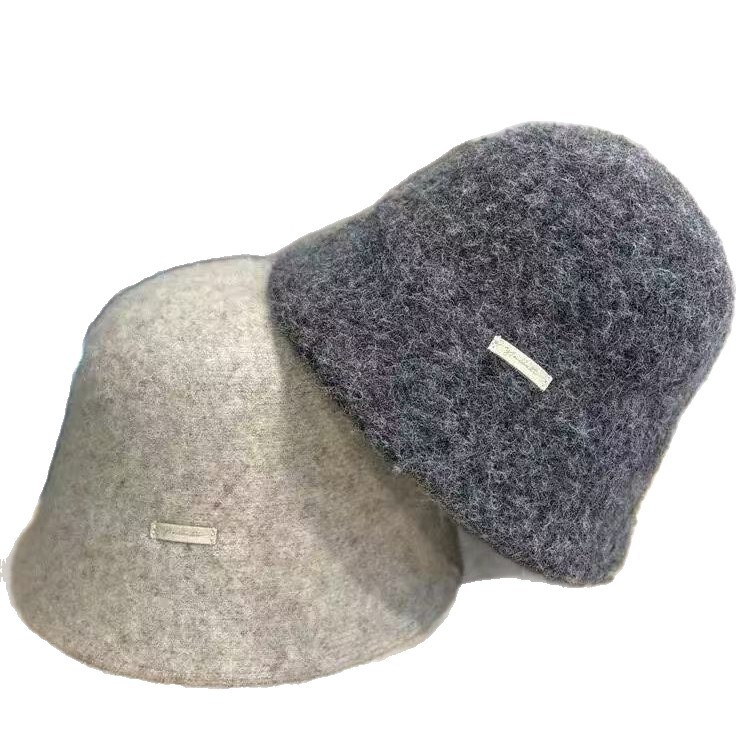 Francia elegante sombrero de pescador blanco para mujeres otoño y invierno 2025 nuevo estilo artístico para mostrar la cara pequeña sensación simple sombrero de cubo de agua universal