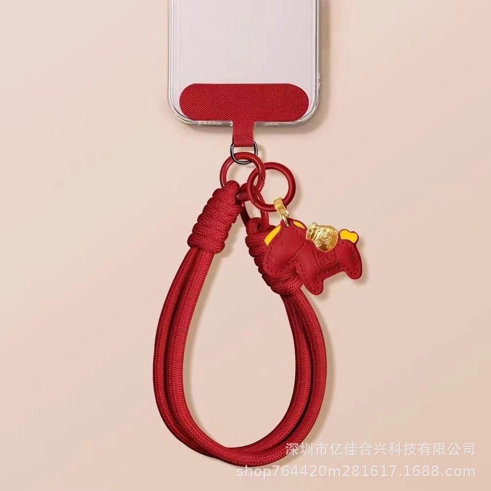 Año del Caballo cadena de teléfono móvil rojo nuevo tipo de pulsera teléfono móvil cuerdas de muñeca tejiendo robusto cuero accesorios de caballo colgantes