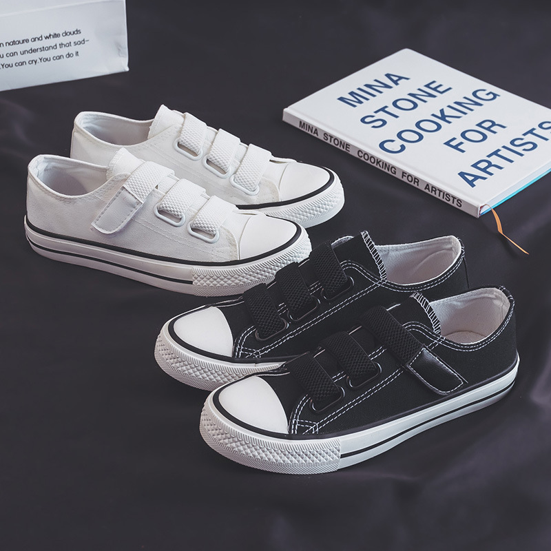 Zapatos de lona bajos de estilo coreano para mujer 2024 Primavera Nueva hebilla zapatos blancos mocasines para estudiantes zapatos de goma vulcanizada zapatos de tela
