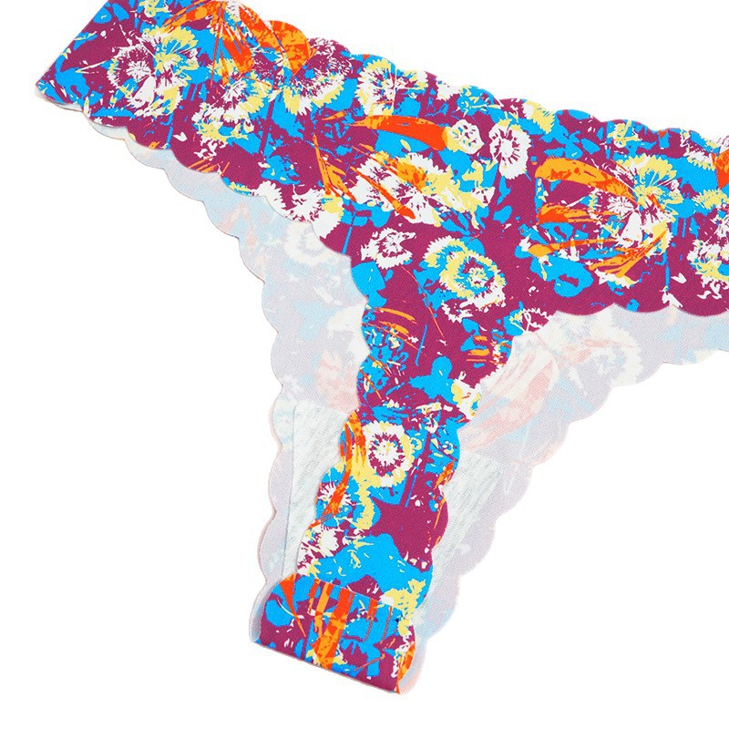Europa y los Estados Unidos invisibles ondulados impresión sin marcas en forma de T pantalones transpirables de cintura baja deportivo sexy thongs mujeres