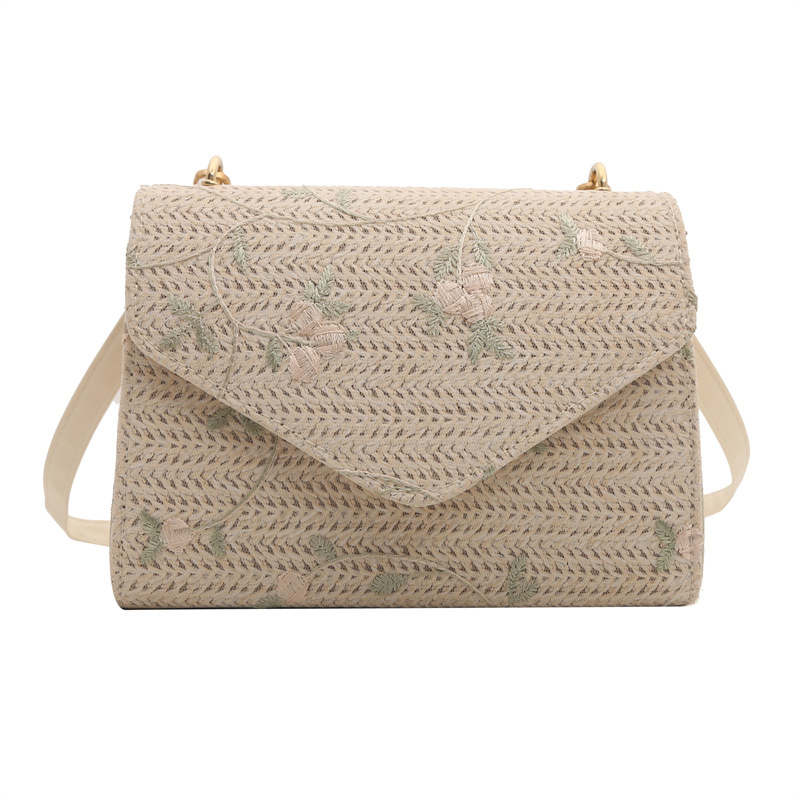 Borsa a tracolla in paglia intrecciata elegante e versatile_voghion.com