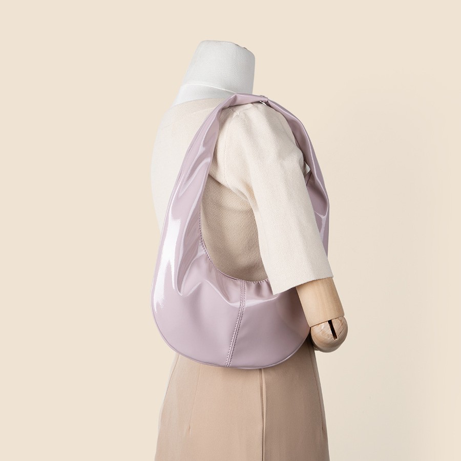 Personalized and fashionable cream colored patent shiny bread PU leather versatile Korean version hand-held armpit_voghion.com