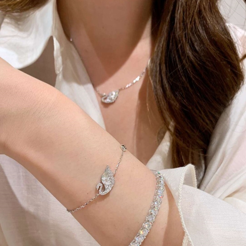 Brushed diamond swan bracelet