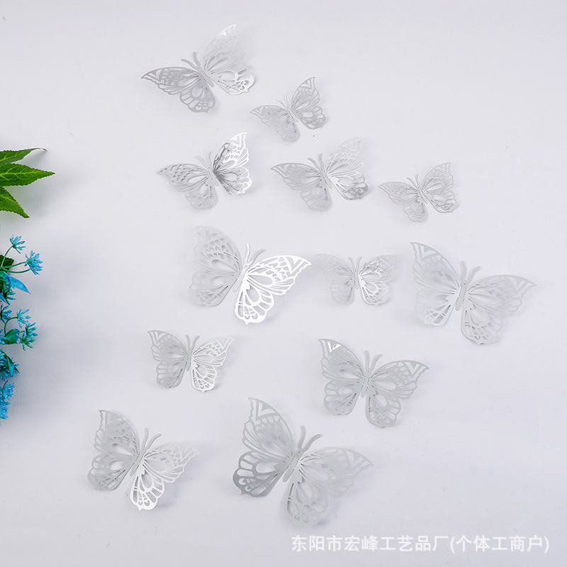 Pegatinas de mariposa tridimensionales huecas de metal transfronterizo, decoración de dormitorios para el hogar, pegatinas de pared 3D, pegatinas de joyería tridimensionales navideñas