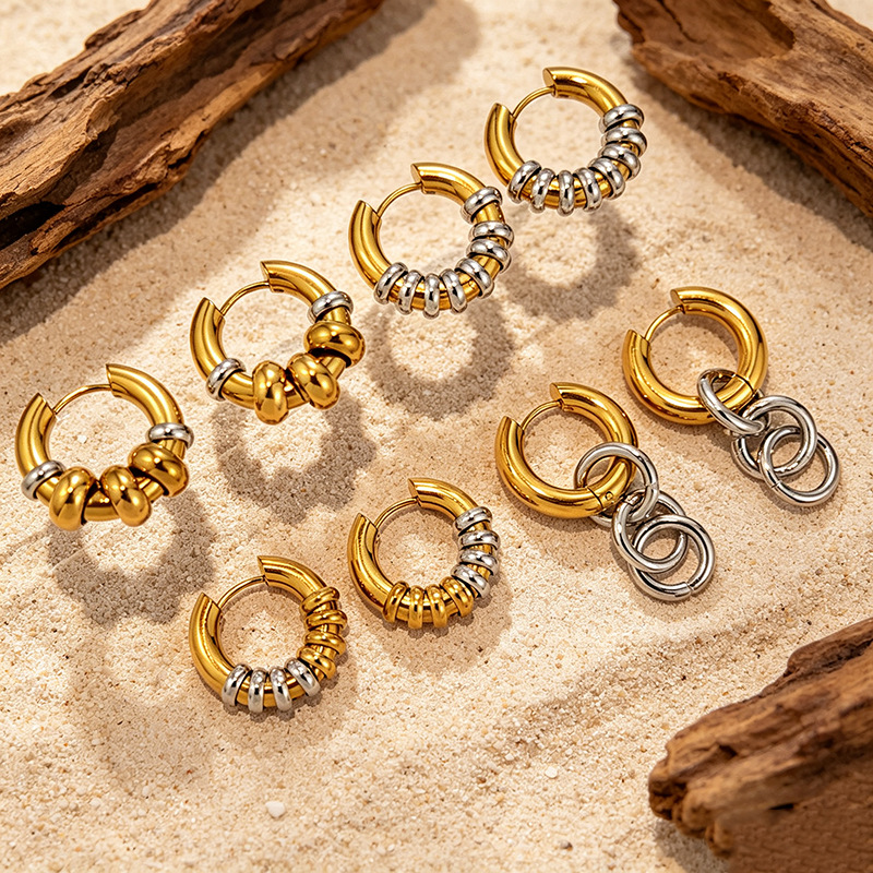 European and American style color-blocked titanium steel hoop earrings, featuring gold and silver contrasting colors, are tarnish-resistant, made of stainless steel, and offer a luxurious and high-end look, making them ideal for cross-border sales as women's accessories