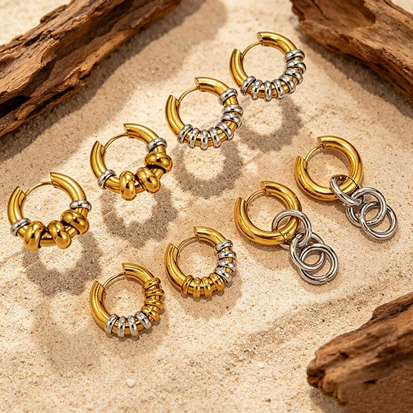 European and American style color-blocked titanium steel hoop earrings, featuring gold and silver contrasting colors, are tarnish-resistant, made of stainless steel, and offer a luxurious and high-end look, making them ideal for cross-border sales as women's accessories