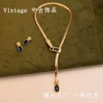 中古Vintage简约蛇骨Y型琉璃项链复古铜镀金锁骨链