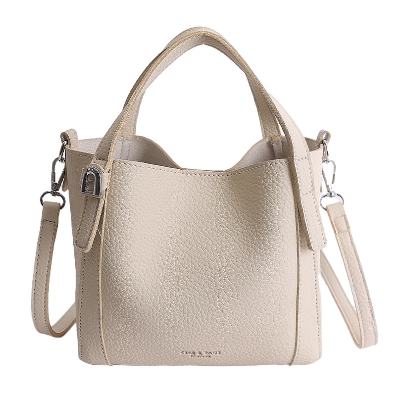 Nicho coreano litchi pattern bolso de cubo de mano mujer comercio exterior nueva moda alta textura ligera lujosa bolsa de mochila