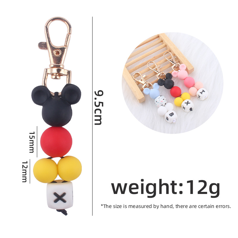 Creativo DIY nueva historieta cuentas pequeño colgante contraste color silicona cuentas llavero colgante bolsa pequeño colgante AliExpress