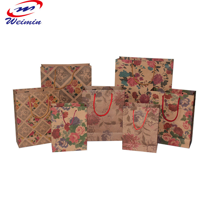 牛皮纸手提袋 花朵图案纸袋服装袋 彩色牛皮纸袋批发