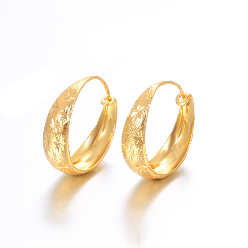 Xuping Europa y los Estados Unidos transfronterizos aretes de flores de aleación de cobre chapado 24k color círculo geométrico imitación de oro ligero lujo temperamento auriculares