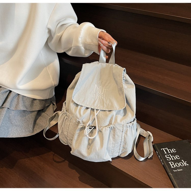 休闲旅行双肩包女2025新款韩版时尚街头书包大学生手拎包通勤背包