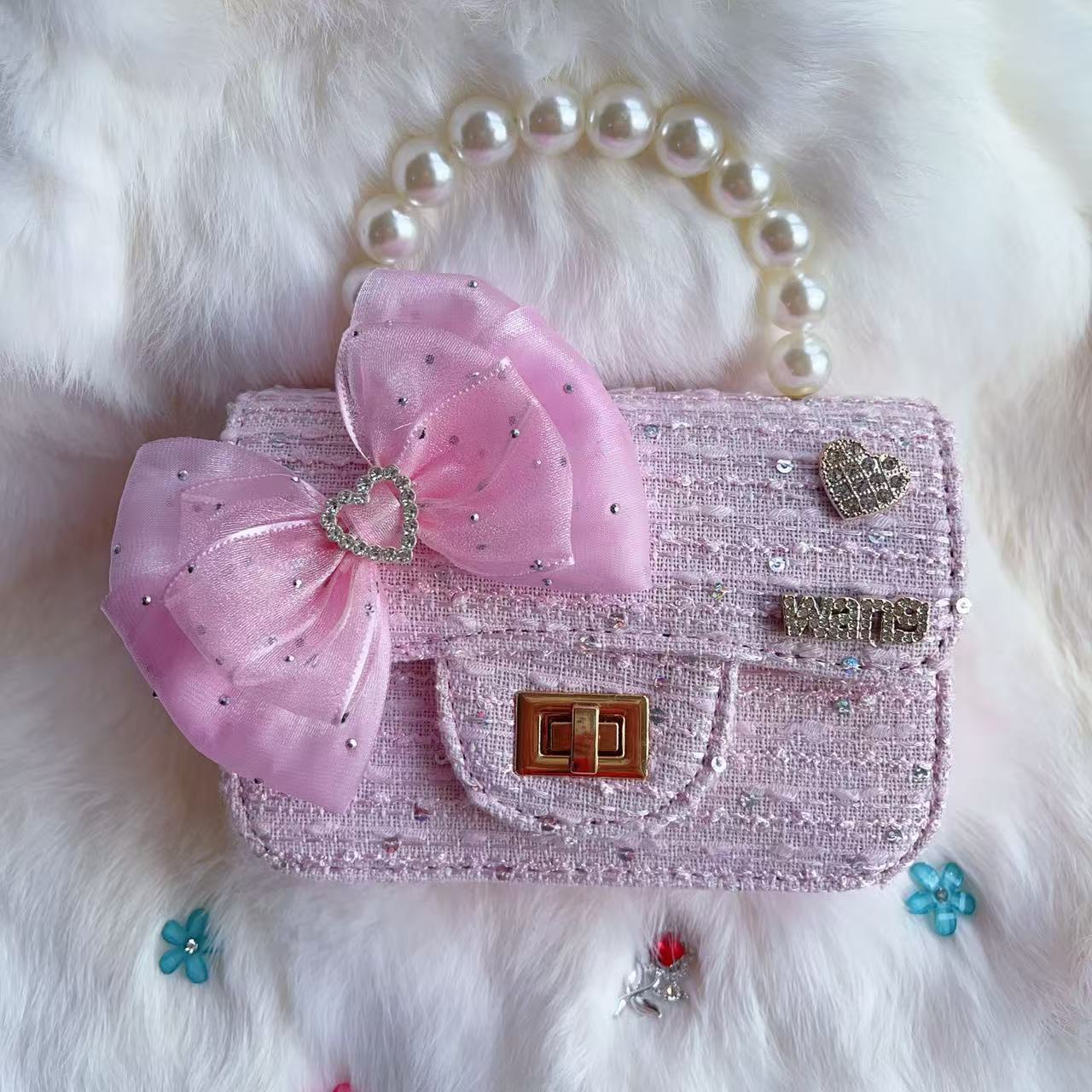 Nuevo tipo de bolsos para niños, bolsos de moda, bolsos de princesa de viento, bolsos portátiles lindos para chicas, bolsos de red para bebés.