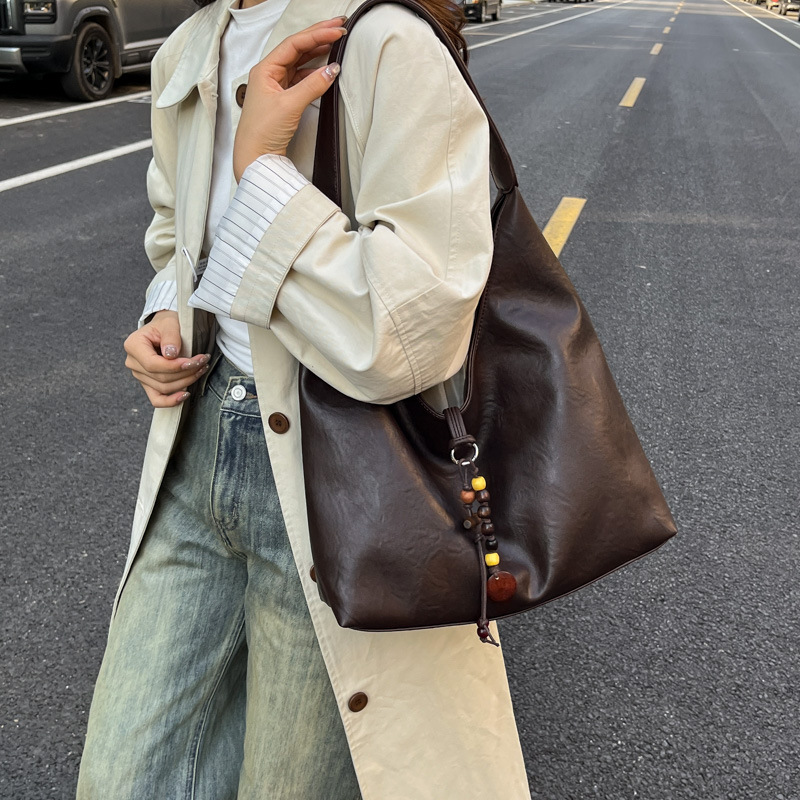 2025 invierno nuevo estilo de alta calidad bolsas de brazo coreanas de moda de gran capacidad bolsas de mano bolsas de hombro retro de viaje de mujer